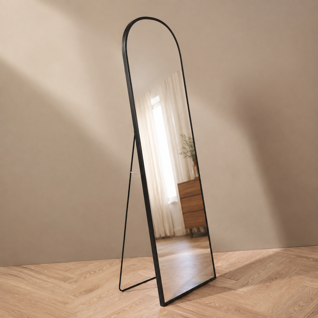 Side view of arched black full-length mirror and slim support leg