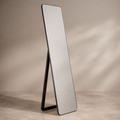 Side view of black full-length mirror with A-frame support stand