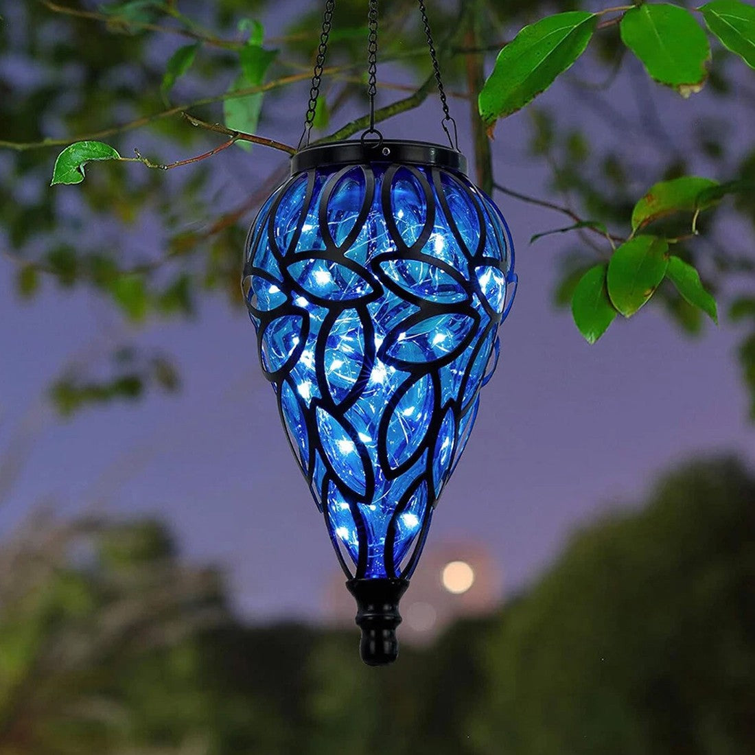 Hanging blue solar lantern for a garden pergola or tree