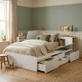 White children’s storage bed with drawers and bookcase three-quarter product view in a children’s bedroom