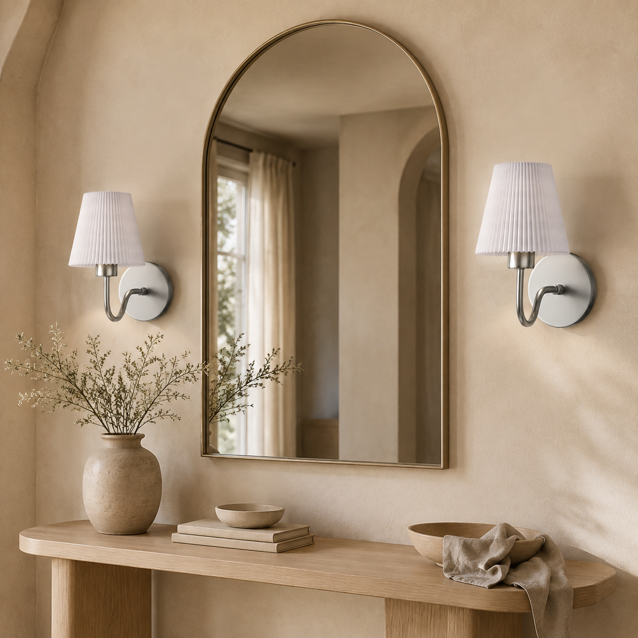 Silver wireless wall lights with pleated shades in a neutral hallway
