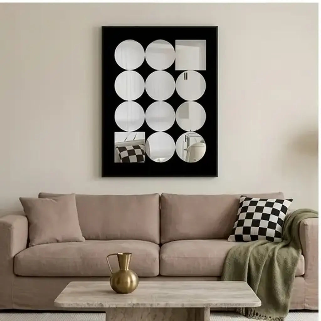 Decorative acrylic mirror wall art with black frame from a customer-friendly angle in a living room
