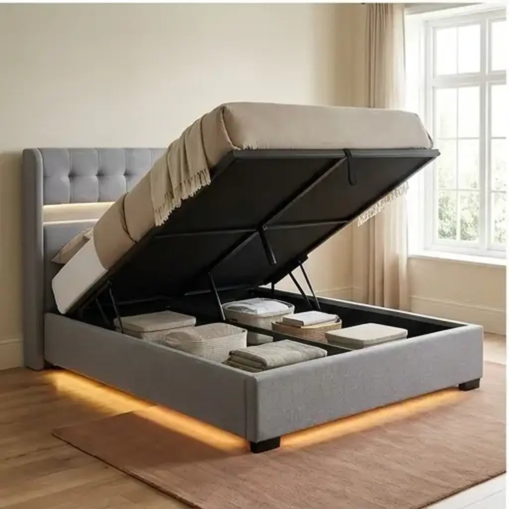 Grey linen double ottoman bed with LED headboard and charging shown at room scale in a bedroom