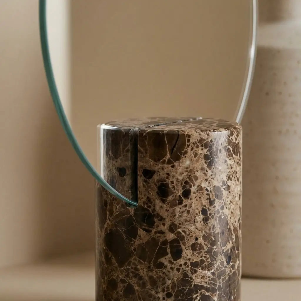 Freestanding vanity mirror with marble-effect base styled in a Nest Cream bedroom