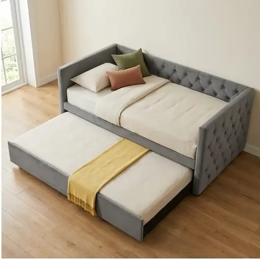 Grey velvet daybed with trundle and charging point three-quarter product view in a guest room