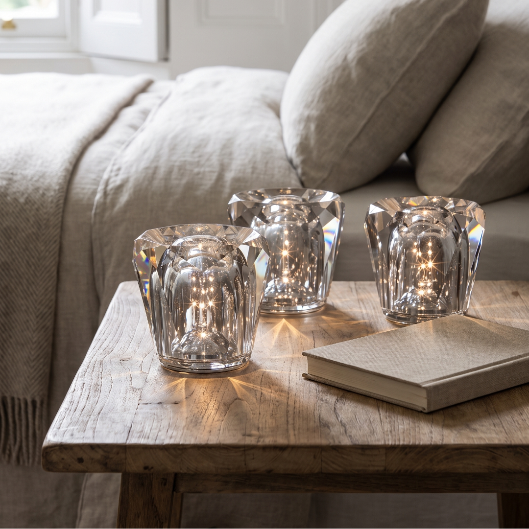 Crystal diamond table lamp on a calm bedside table
