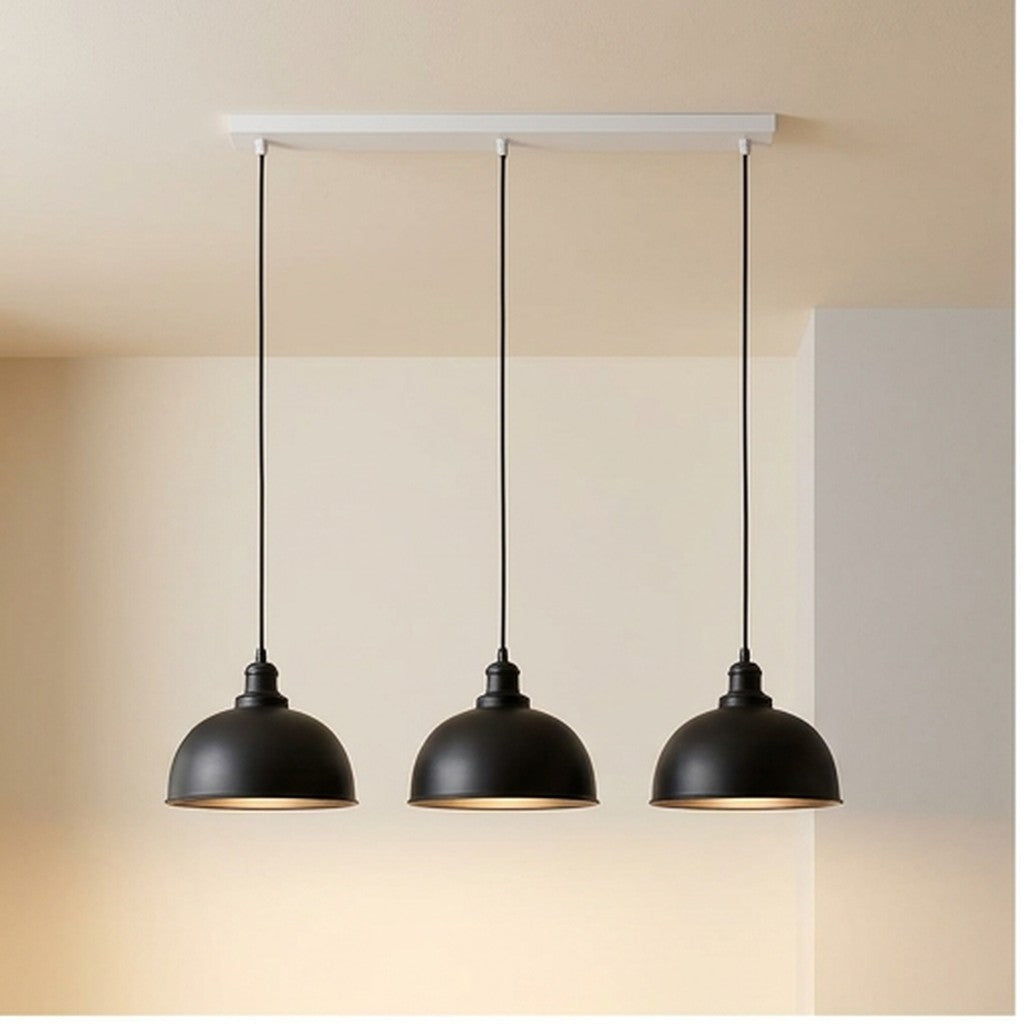 Industrial 3-light pendant with warm glow and white ceiling bar