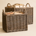 Lined willow log basket set of 2 on a neutral Nestria background