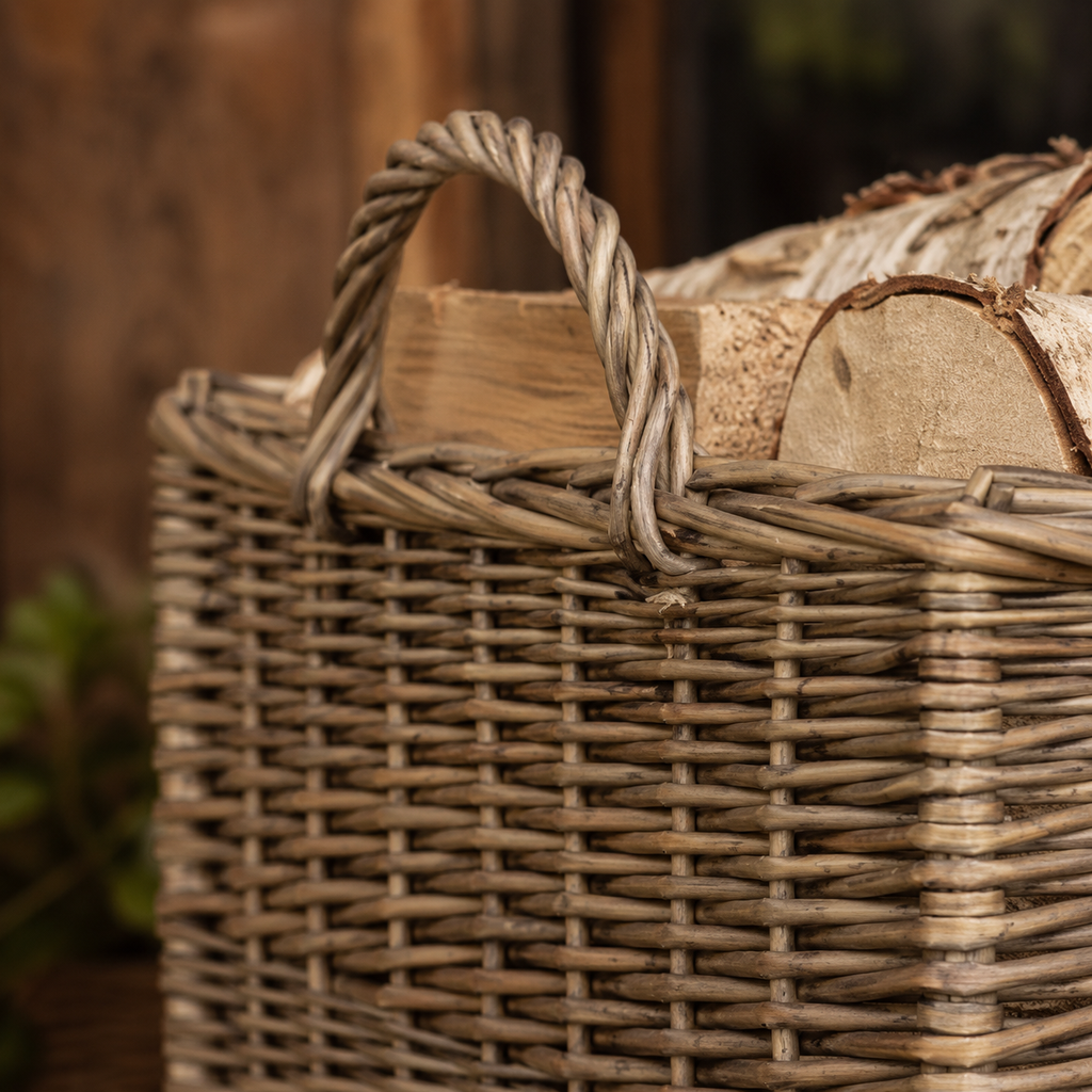 Close-up detail of hand-woven willow wicker handle and hessian lining