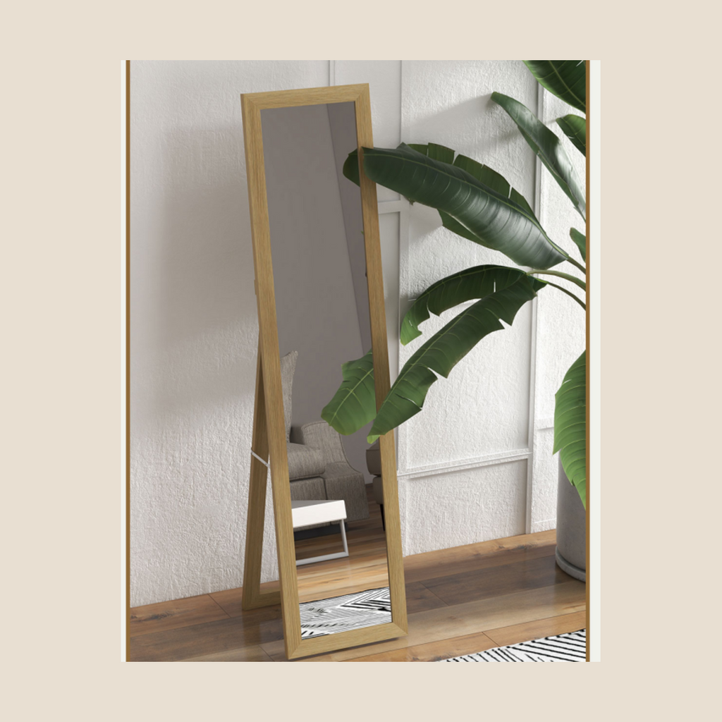 Natural wood full-length mirror shown in floor-standing position