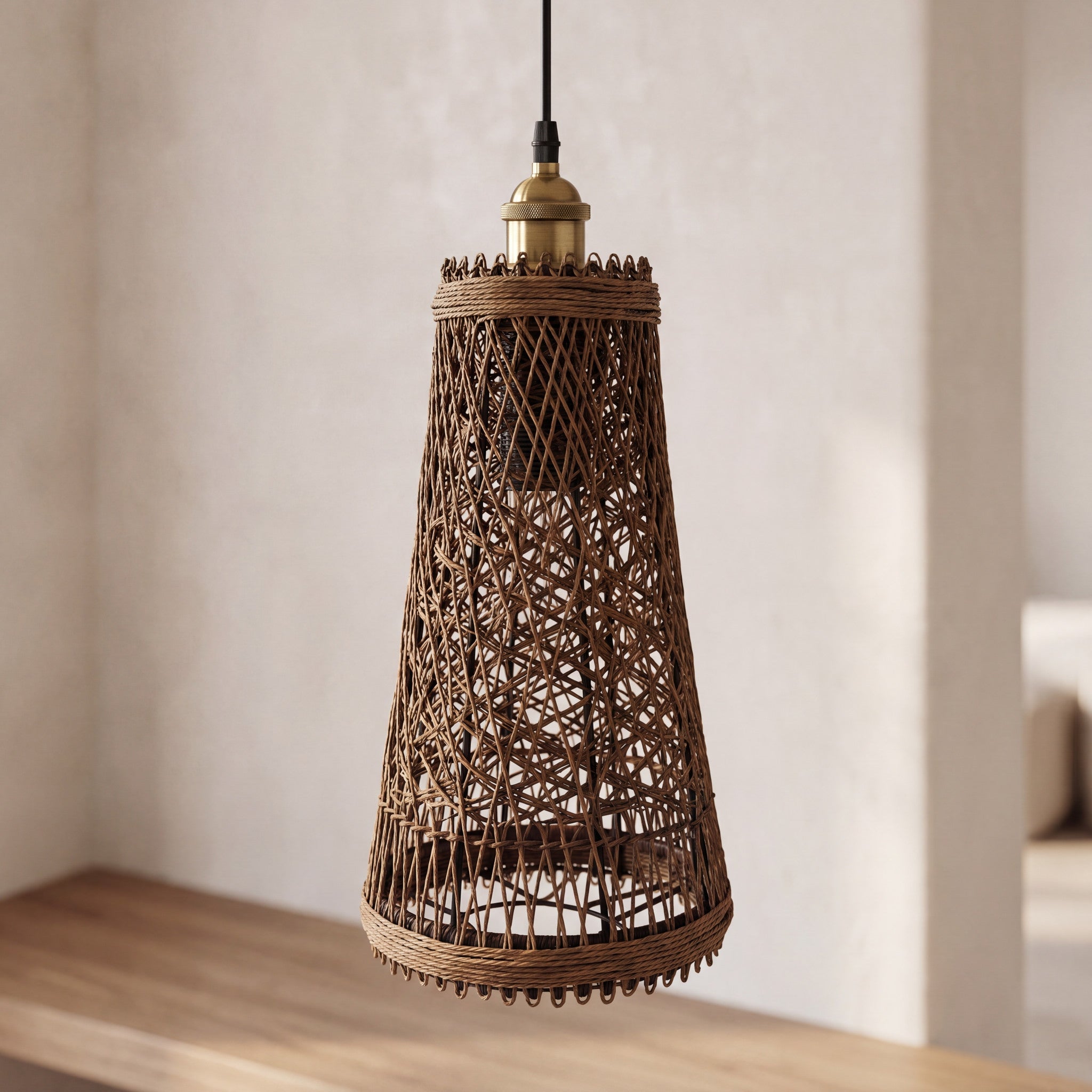 Close-up of the large natural woven shade on a rattan ceiling light