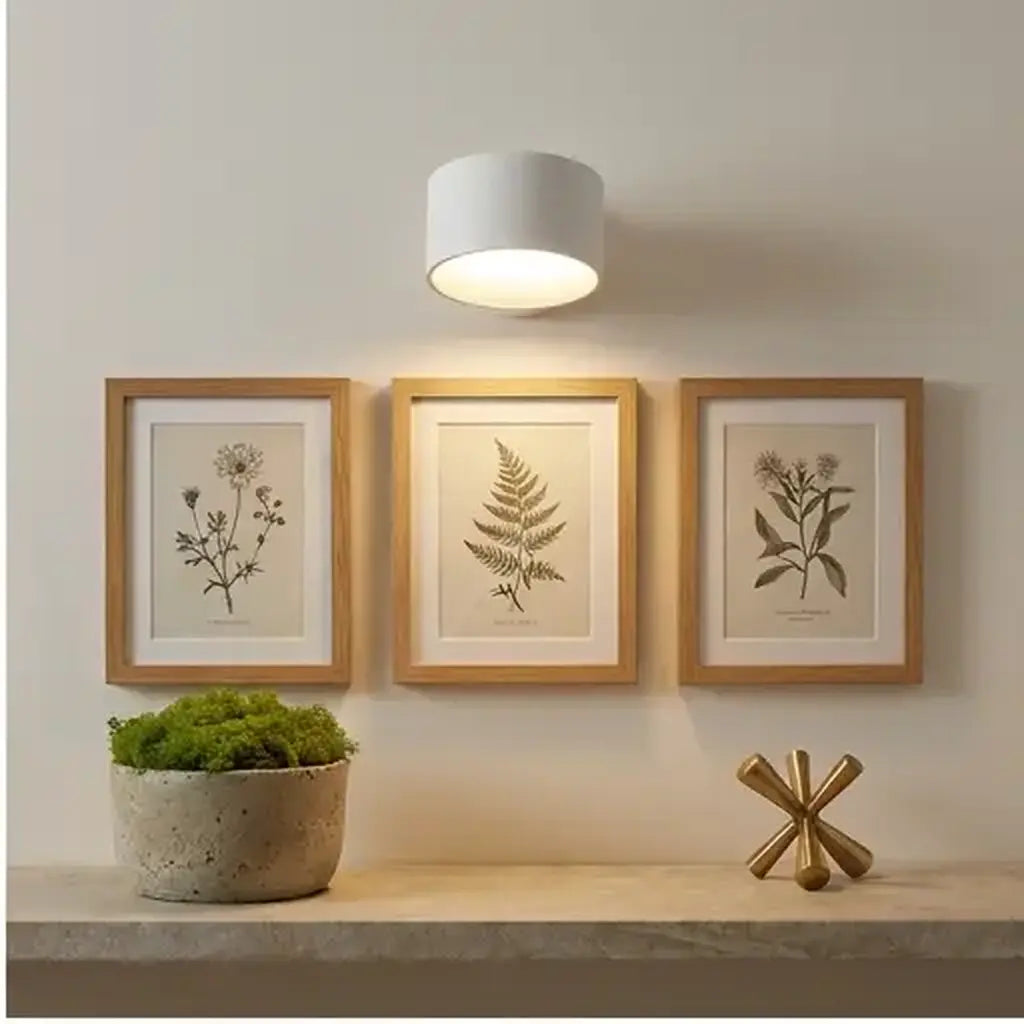 Rechargeable wall light with warm white LED from a customer-friendly angle in a bedroom