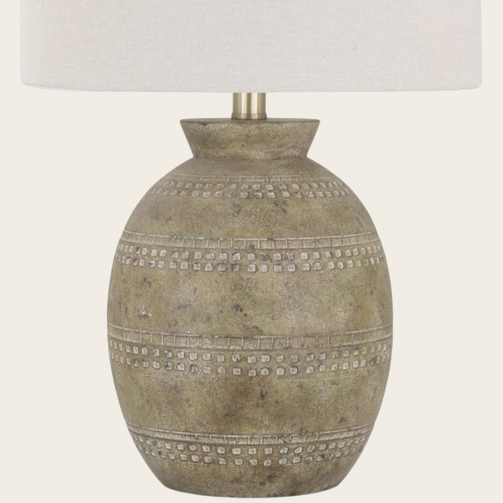 Close-up of the rounded rustic ceramic lamp base