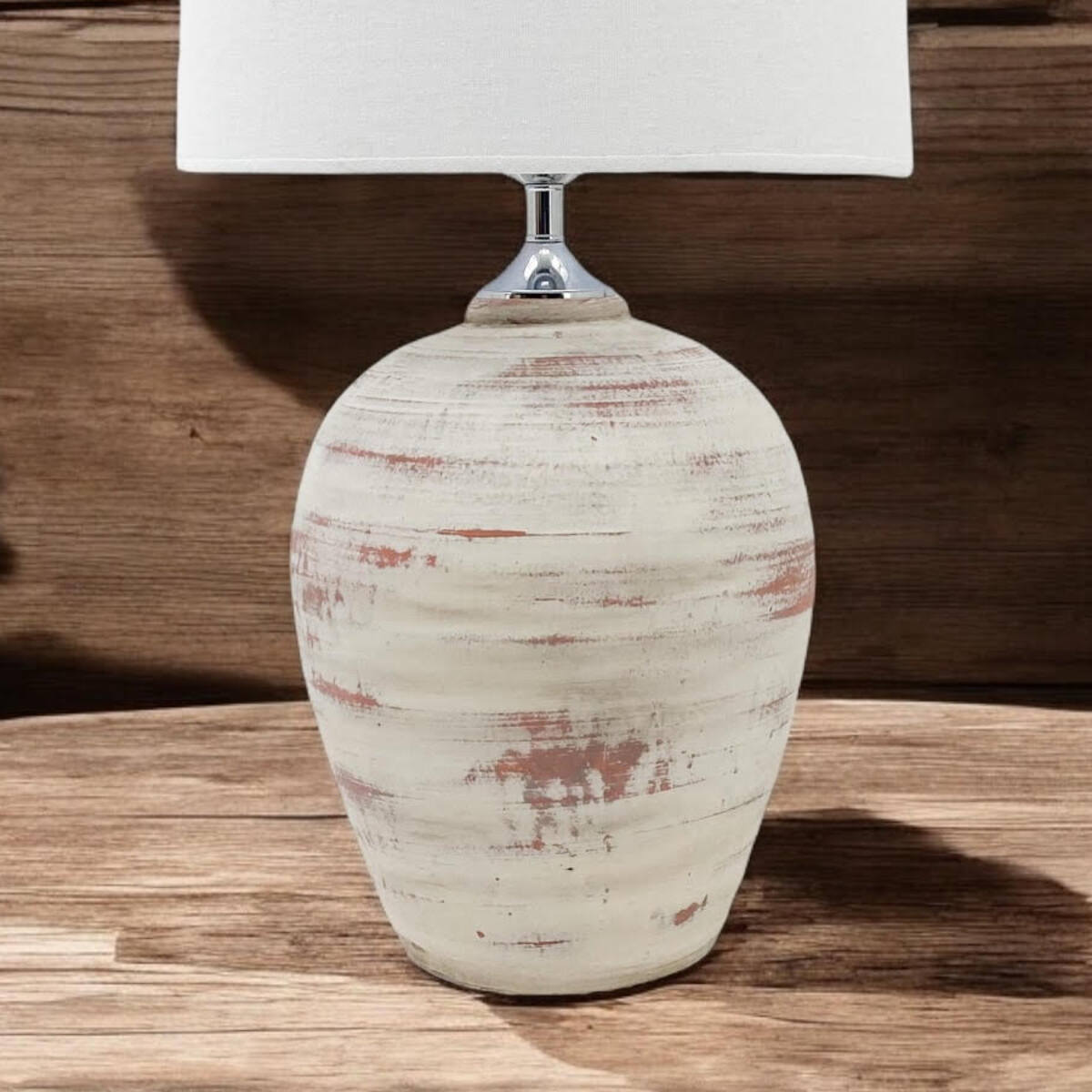 Close-up of the rustic cream ceramic table lamp base