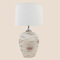 Rustic cream ceramic table lamp with white fabric drum shade