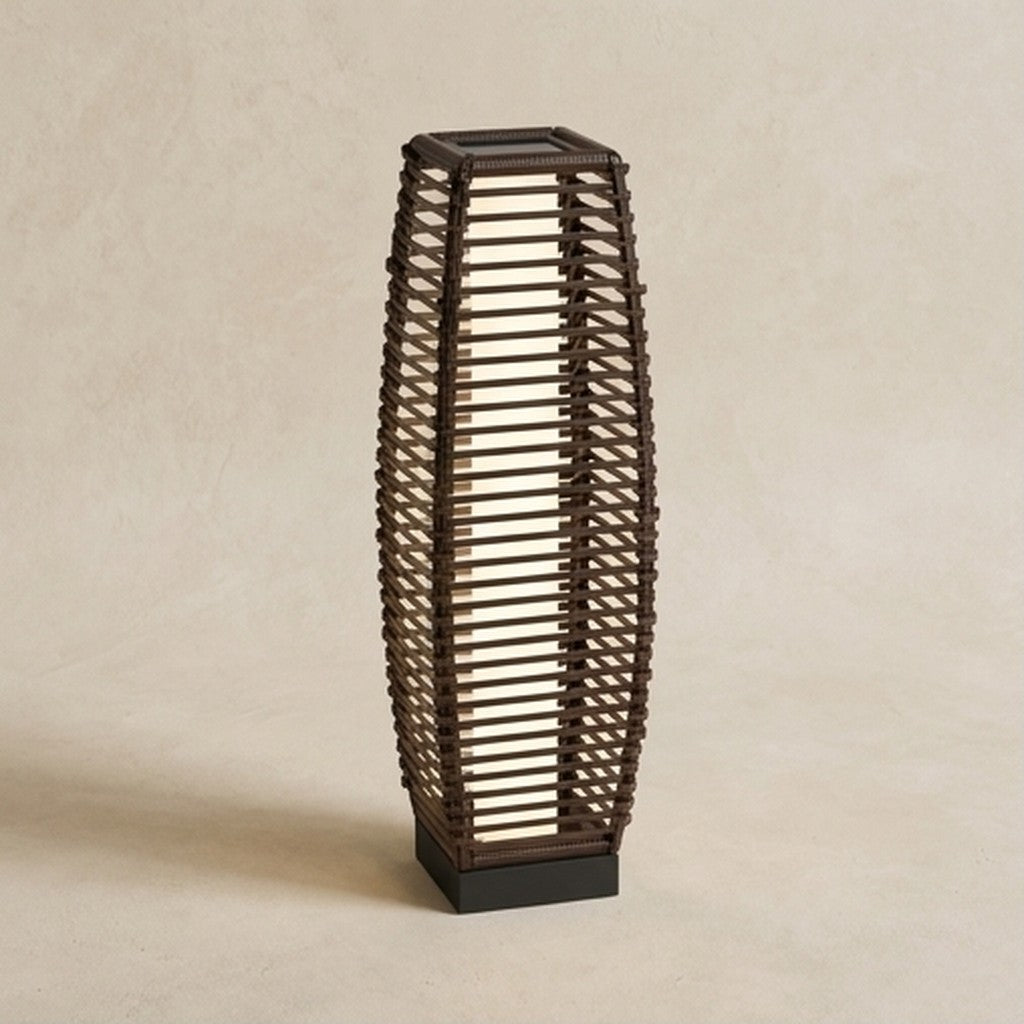Brown rattan-effect solar floor lamp on a neutral background
