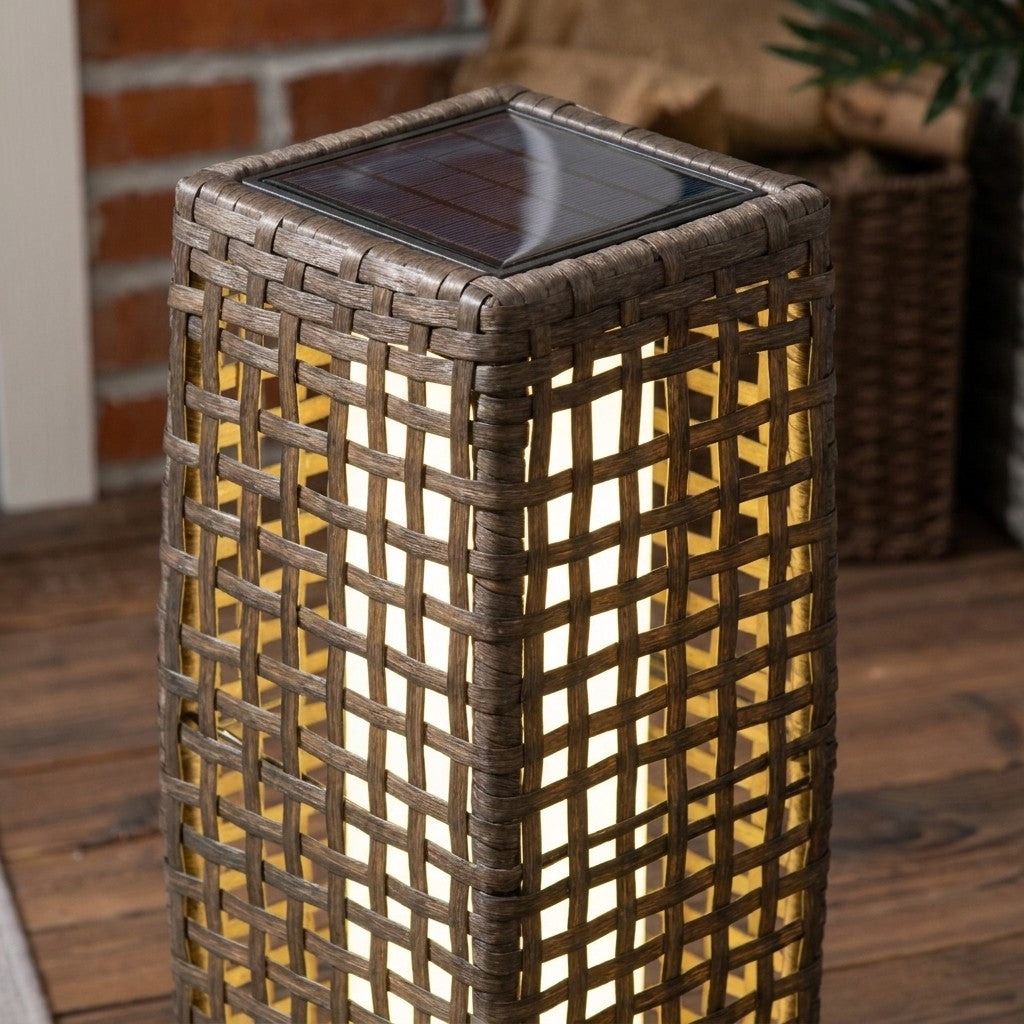 Close-up of rattan-effect solar garden lantern and solar panel