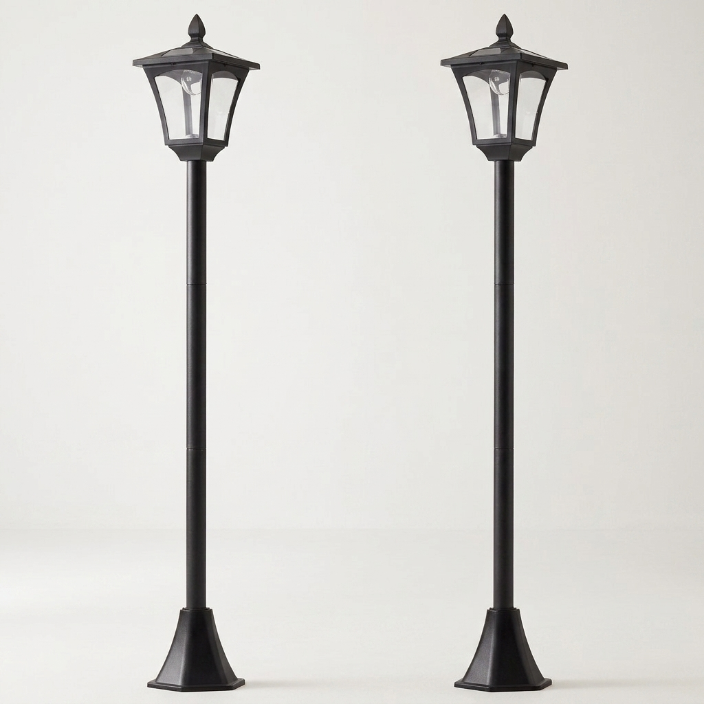 Pair of black solar post lanterns on a white background