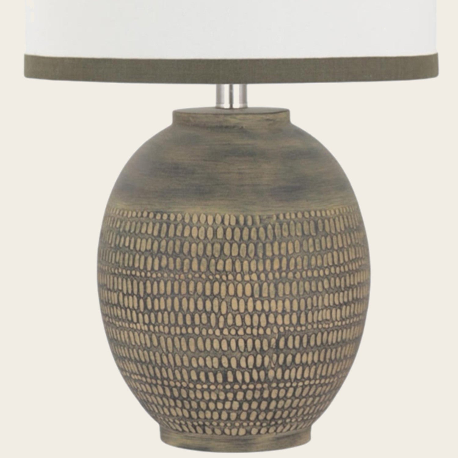 Close-up of the rounded textured ceramic lamp base