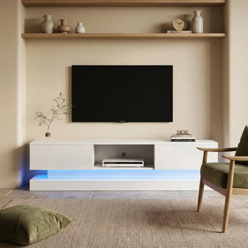 White high-gloss 160cm LED TV unit with storage in soft natural daylight in a living room
