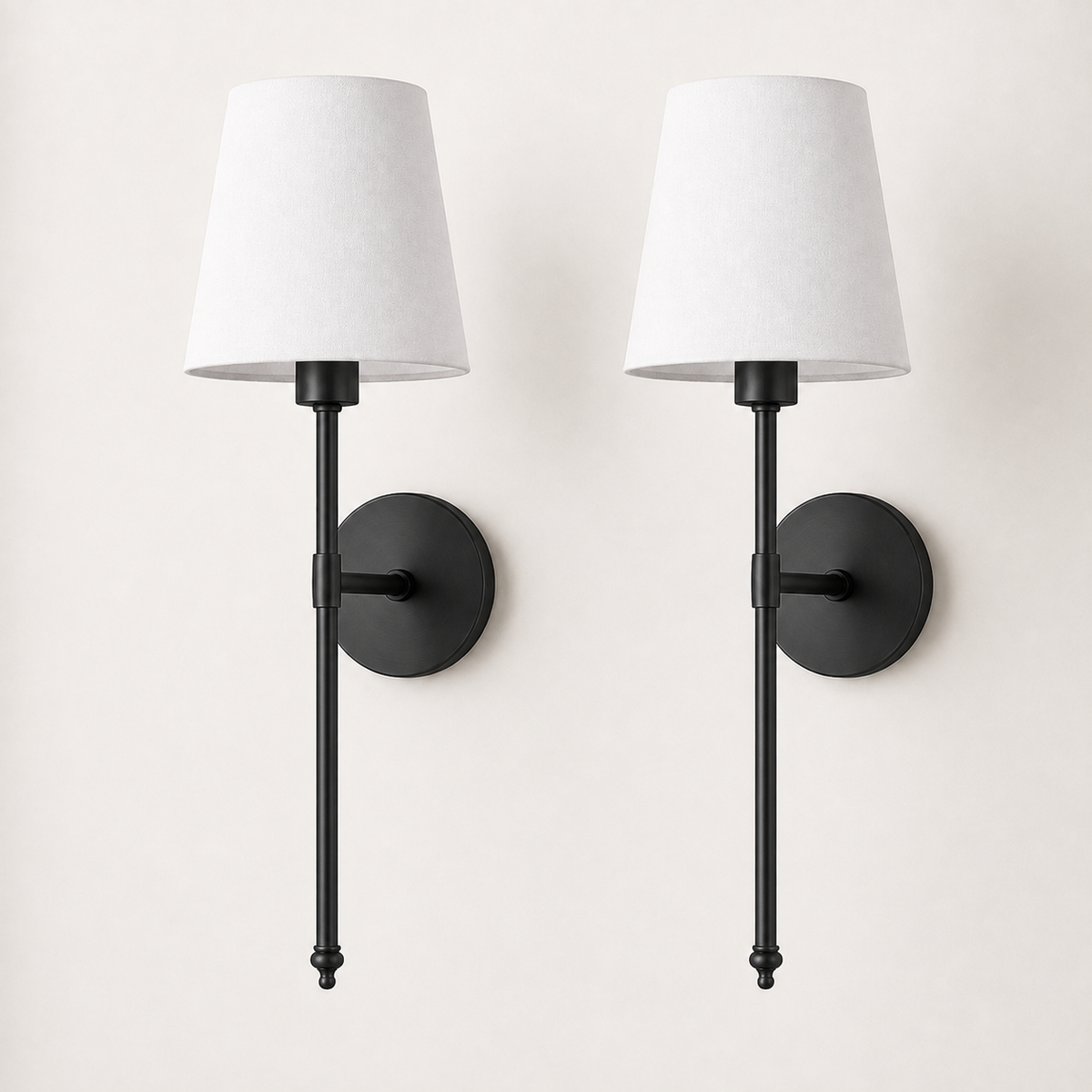 Set of two black wireless wall sconces with white fabric shades