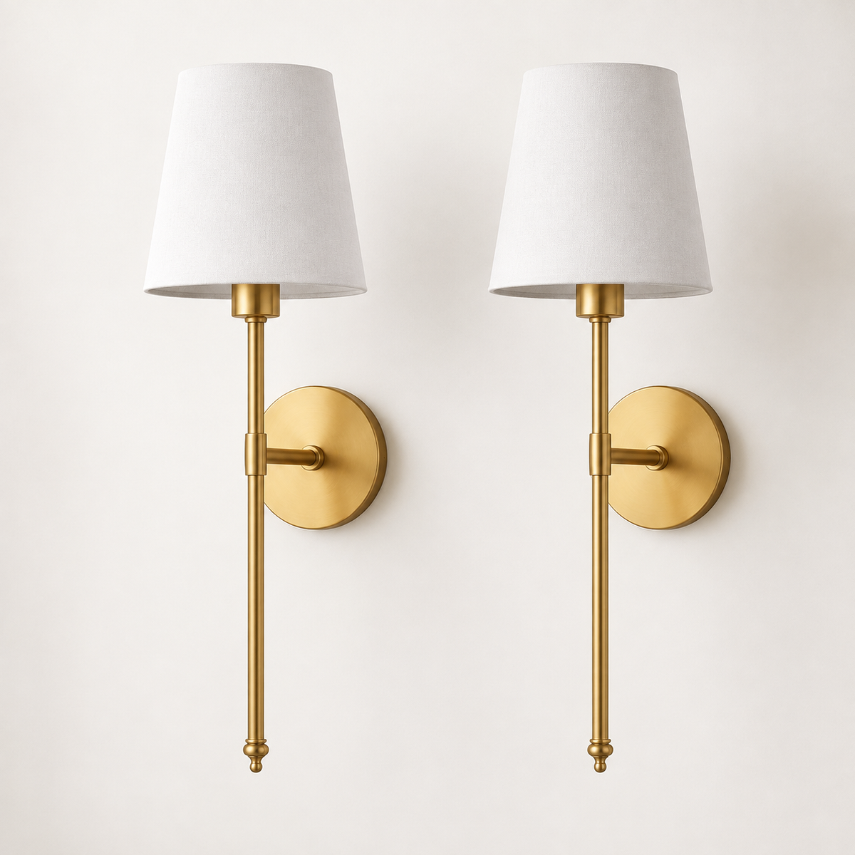 Wireless wall sconces above a hallway console table and mirror