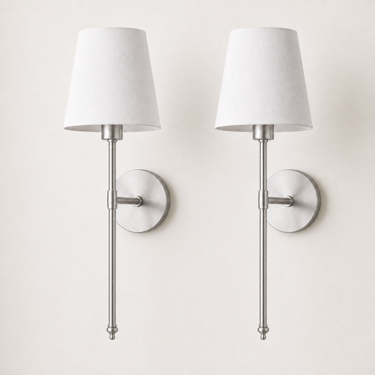 Set of two silver wireless wall sconces with white fabric shades